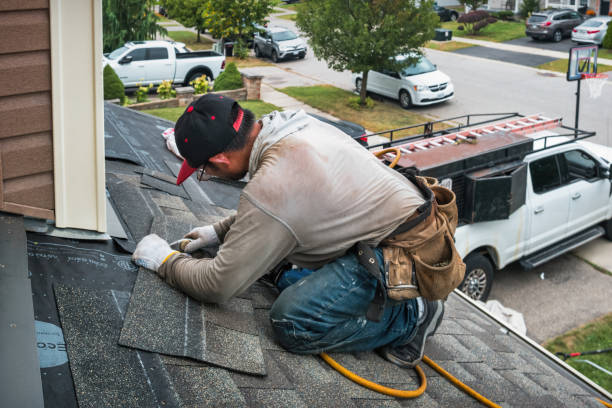 Professional Roofing technician working in East Olympia, WA